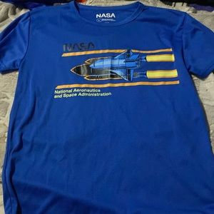 A blue NASA shirt